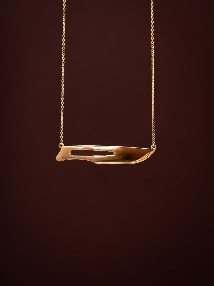 Close up of rose gold 10 Blade Scalpel Pendant Necklace