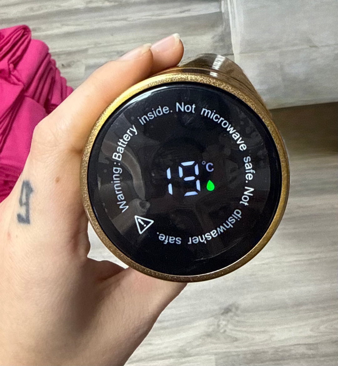 Close up of LED temperature display on gold Smart Water Bottle  