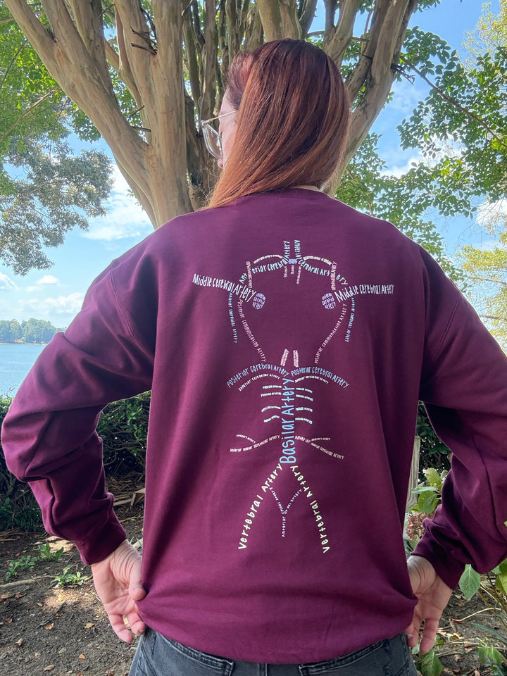 Ladyspinedoc wearing a maroon Whatchu Talkin’ About Willis sweatshirt outdoors