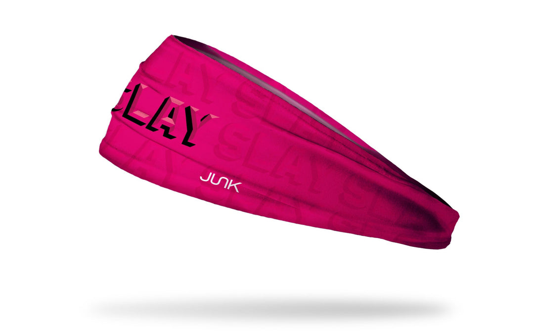 A pink Ladyspinedoc x Junk athletic headband with the word SLAY on the front