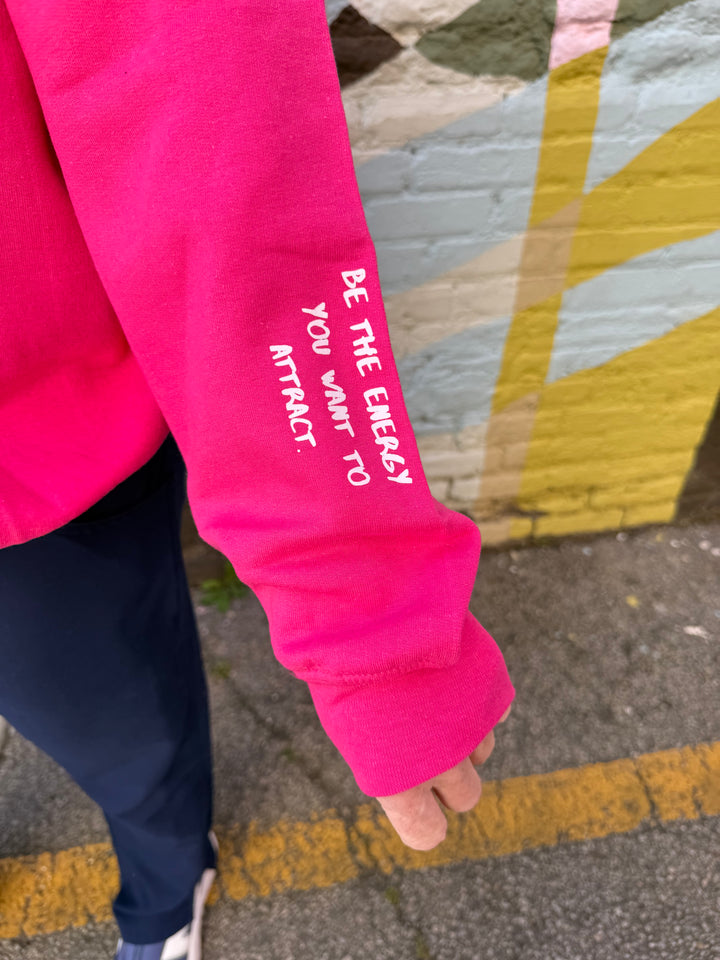 The Power Within Crewneck Sweatshirt - Pink Shirt with "BE THE ENERGY YOU WANT TO ATTRACT" Motto on sleeve