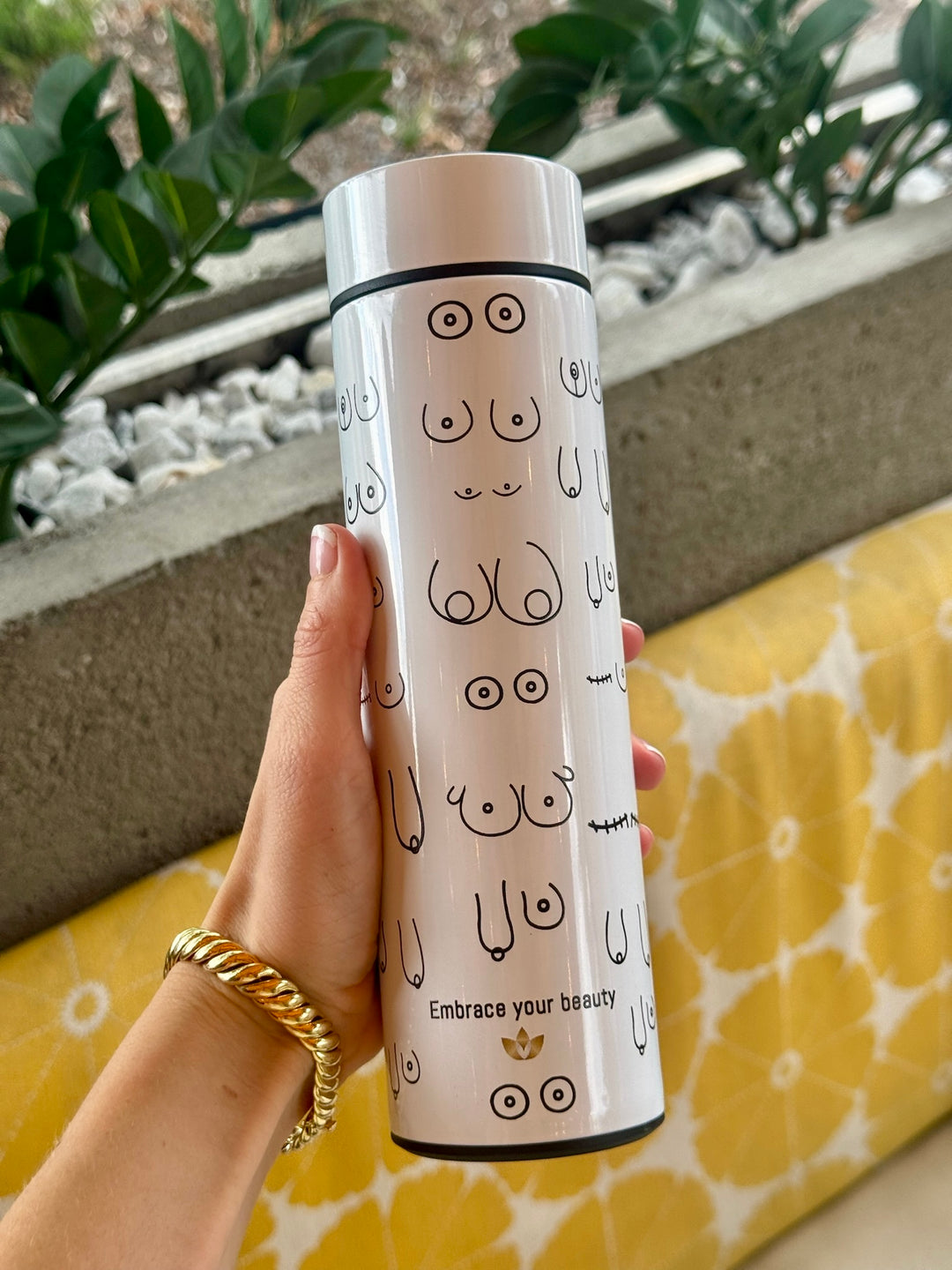 Person holding white Smart Water Bottle with LED Temperature Display