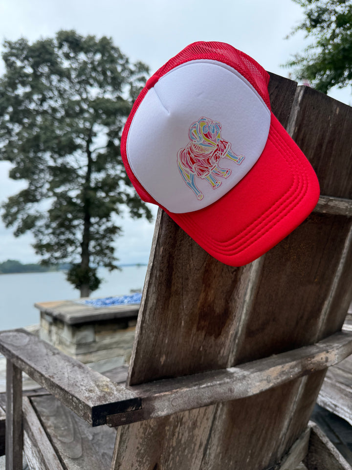 Red and White Game Day Trucker Hat - Bulldog Cap hanging on back of chair.